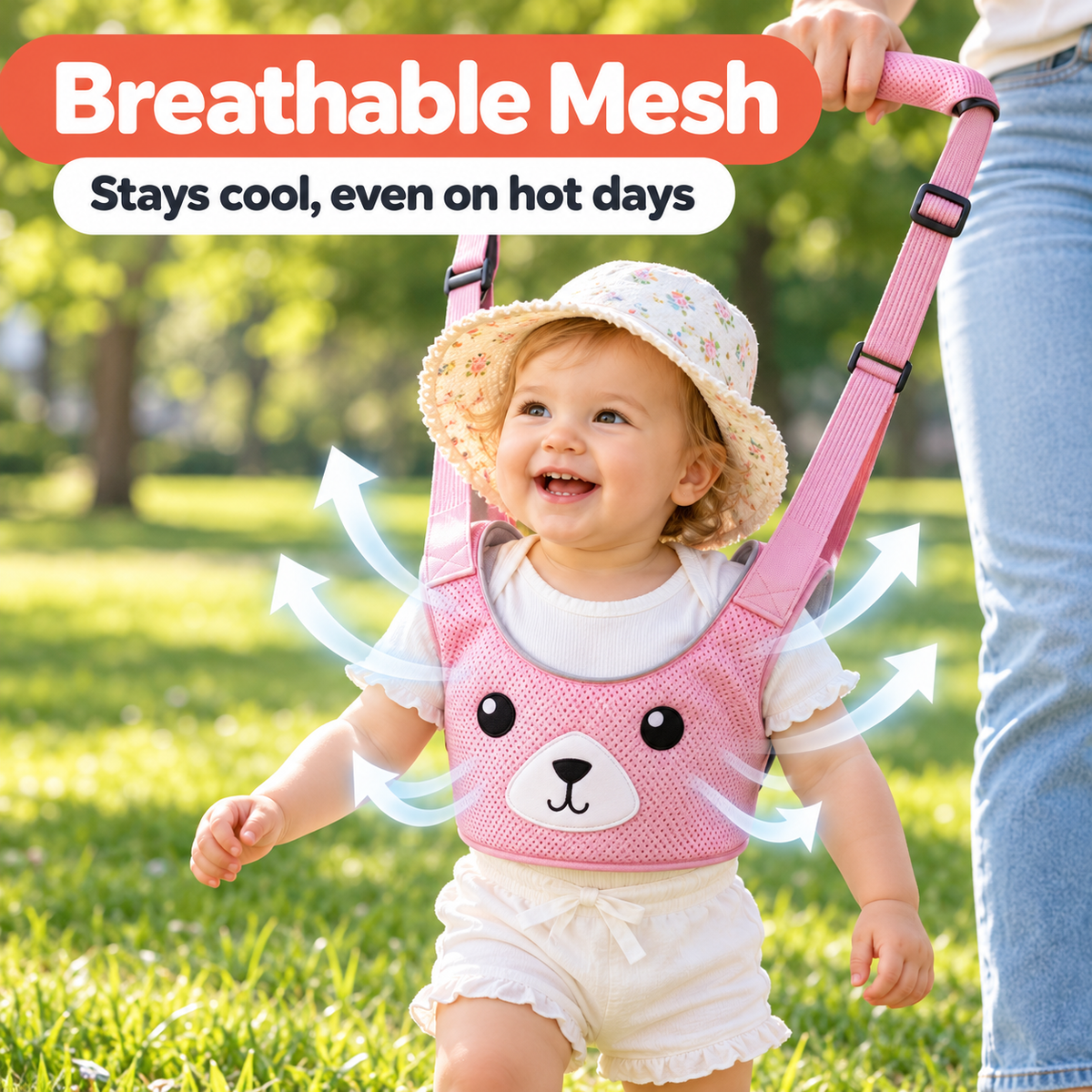 Baby girl walking in the park wearing a breathable pink mesh walking harness